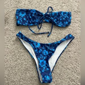 a blue floral bikini strapless with a tie in the front